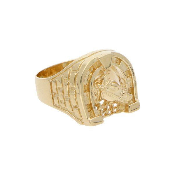 Anillo estilizado motivo herradura con caballo en oro amarillo 14 kilates.