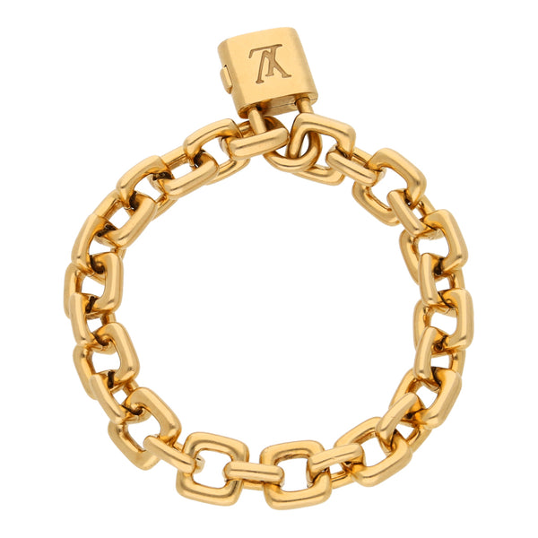 Pulsera eslabón cruzado firma Louis Vuitton en oro amarillo 18 kilates.