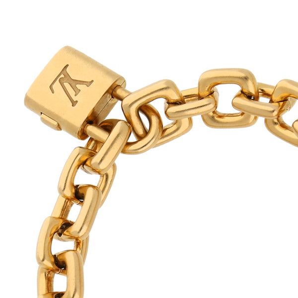 Pulsera eslabón cruzado firma Louis Vuitton en oro amarillo 18 kilates.