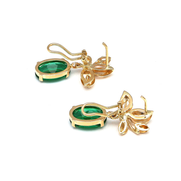 Aretes articulados motivo hojas con obsidianas verdes y circonias en oro amarillo 14 kilates.