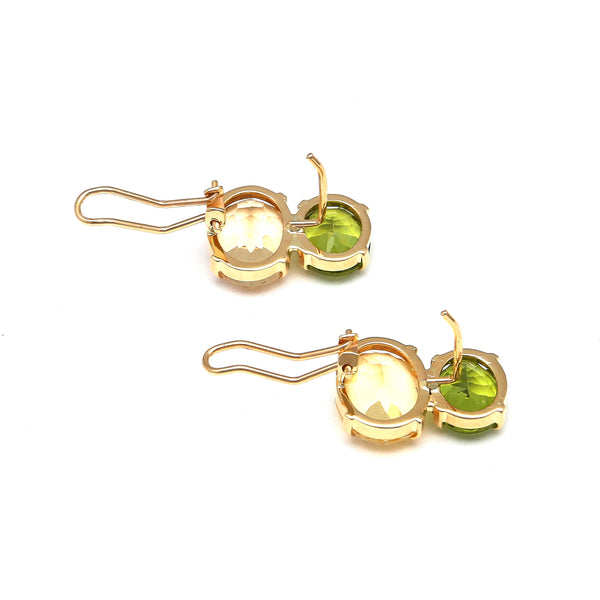 Aretes estilizados con citrinos y peridotos en oro amarillo 14 kilates.