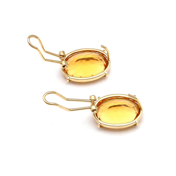 Juego de anillo y aretes diseño especial con citrinos en oro amarillo 14 kilates.