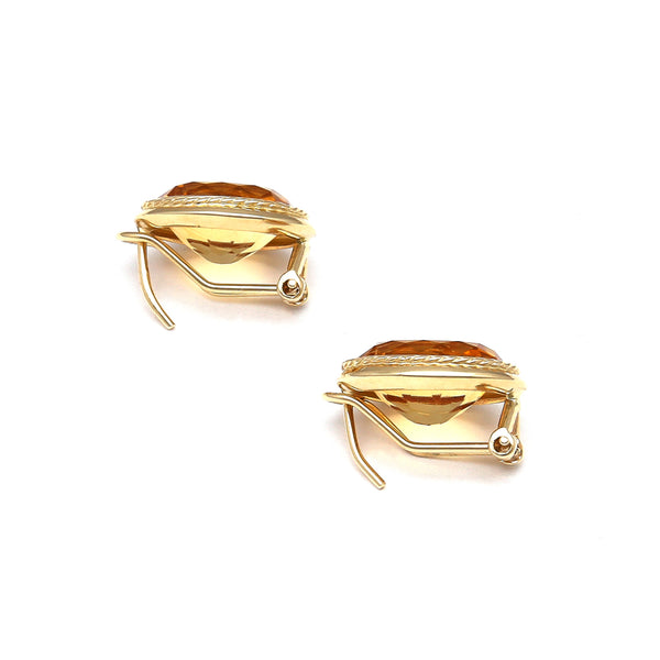 Aretes diseño especial con citrinos en oro amarillo 14 kilates.