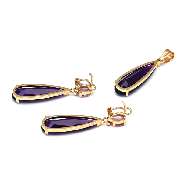 Juego de dije y aretes diseño especial con diamantes y amatista en oro amarillo 14 kilates.