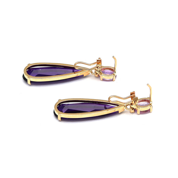 Juego de dije y aretes diseño especial con diamantes y amatista en oro amarillo 14 kilates.