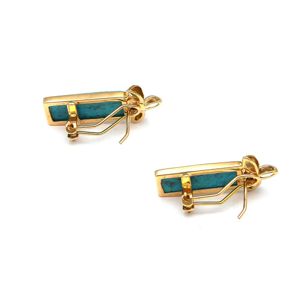 Aretes estilizados con turquesas y circonias en oro amarillo 14 kilates.