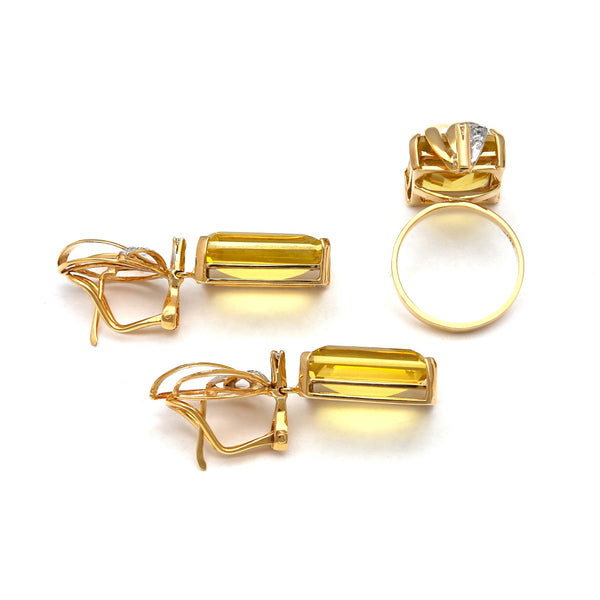 Juego de anillo y aretes estilizados con diamantes y citrinos miel en oro amarillo 14 kilates.