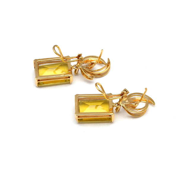 Juego de anillo y aretes estilizados con diamantes y citrinos miel en oro amarillo 14 kilates.