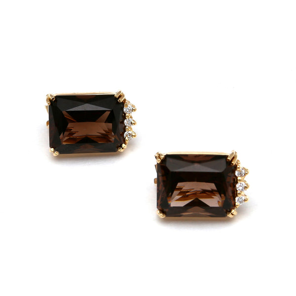 Aretes diseño especial con diamantes y topacios ahumados en oro amarillo 14 kilates.