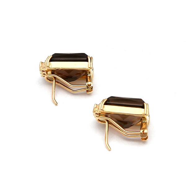 Aretes diseño especial con diamantes y topacios ahumados en oro amarillo 14 kilates.