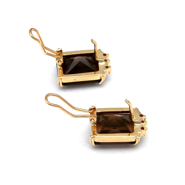 Aretes diseño especial con diamantes y topacios ahumados en oro amarillo 14 kilates.