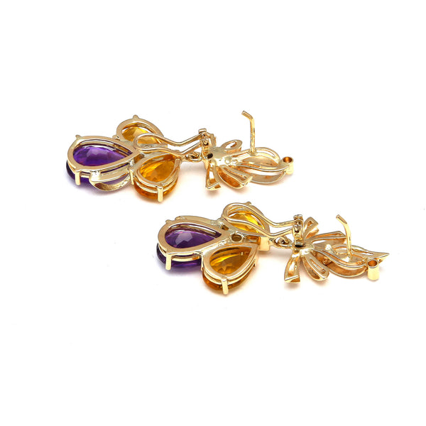 Aretes estilizados con amatista, citrinos y circonias en oro amarillo 14 kilates.