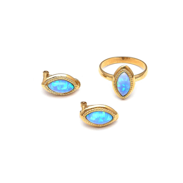 Juego de anillo y aretes diseño especial con ópalos azules en oro amarillo 14 kilates.