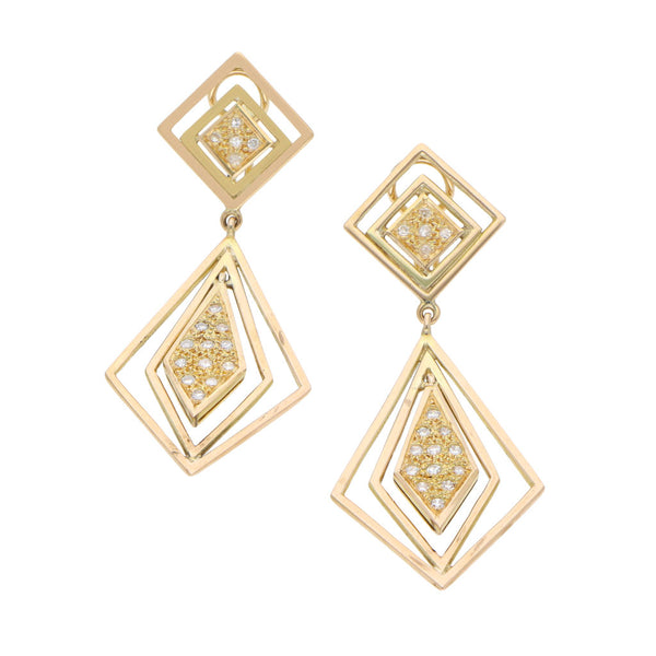 Aretes estilizados articulados con diamantes en oro amarillo 14 kilates.