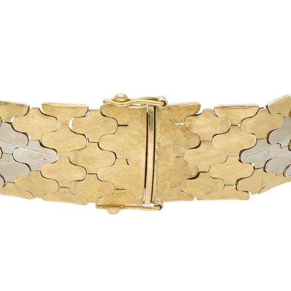 Pulsera eslabón articulado labrado en oro amarillo 18 kilates.