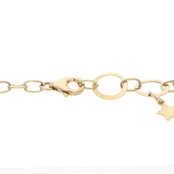 Pulsera eslabón cruzado combinado con catorce dijes motivo estrellas en oro amarillo 14 kilates.