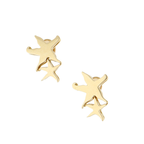 Broqueles estilizados motivo estrellas en oro amarillo 14 kilates.