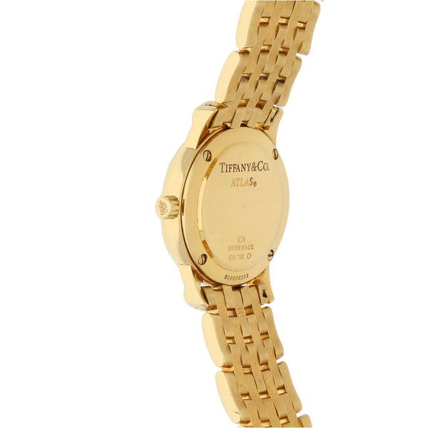 Reloj Tiffany & Co para dama modelo Atlas en oro amarillo 18 kilates.