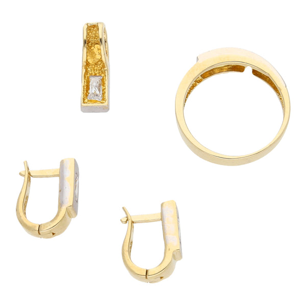 Juego de anillo, dije y aretes diseño especial con circonias en oro amarillo 14 kilates.