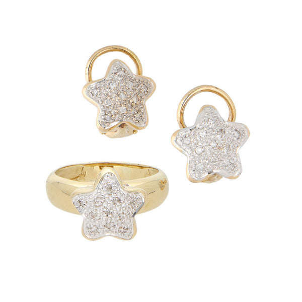 Juego de anillo y aretes diseño especial motivo estrella con diamantes en oro amarillo 14 kilates.