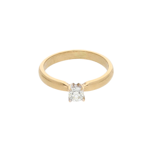 Anillo solitario con diamante en oro amarillo 14 kilates.