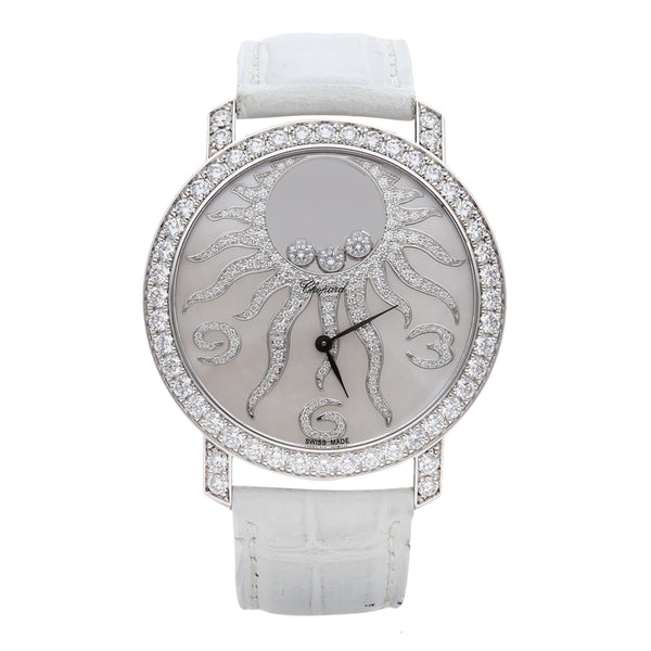 Reloj Chopard para dama modelo Happy Sun caja en oro blanco 18 kilates.