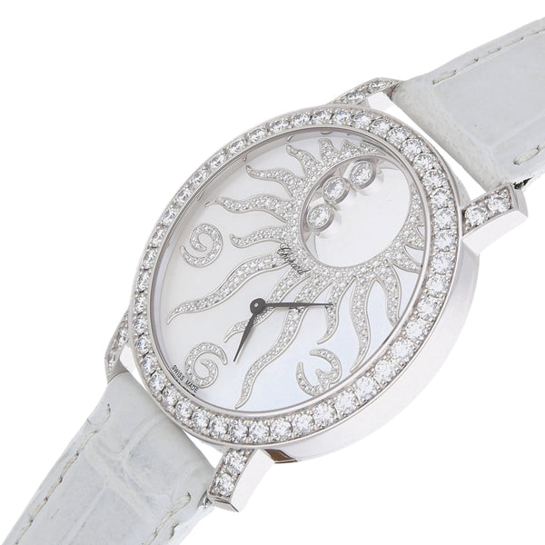 Reloj Chopard para dama modelo Happy Sun caja en oro blanco 18 kilates.