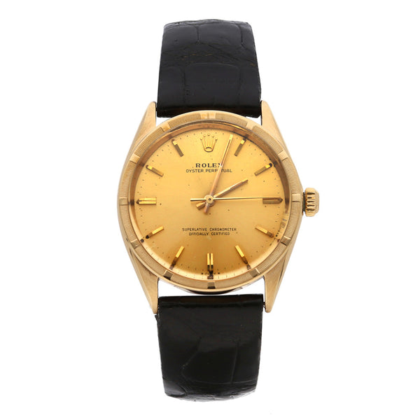 Reloj Rolex para caballero modelo Oyster Perpetual caja en oro amarillo 18 kilates.