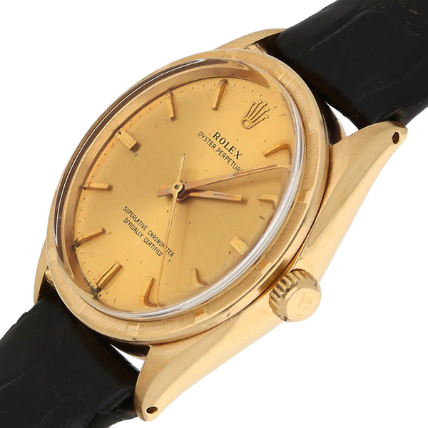 Reloj Rolex para caballero modelo Oyster Perpetual caja en oro amarillo 18 kilates.