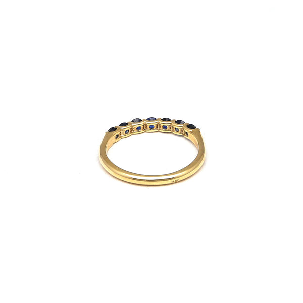 Anillo diseño especial con zafiros en oro amarillo 14 kilates.