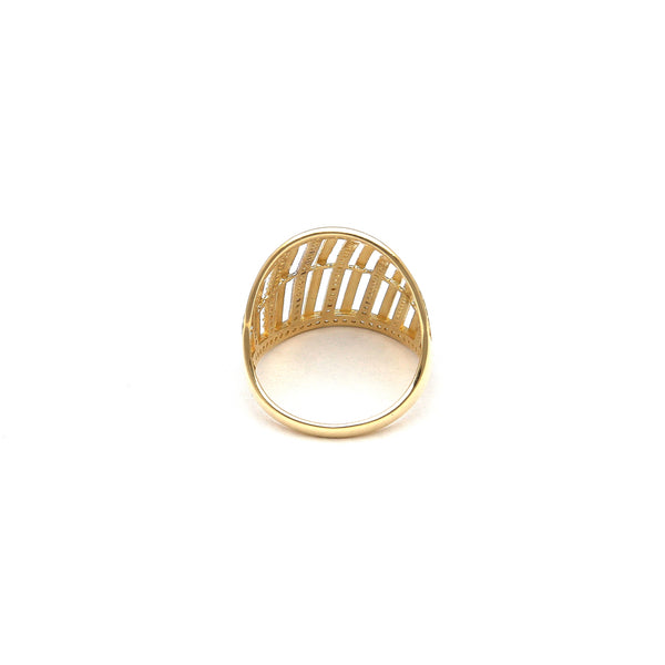 Anillo calado con circonias en oro amarillo 14 kilates.