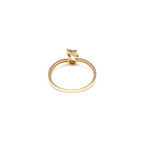 Anillo calado motivo gato con circonias en oro amarillo 14 kilates.