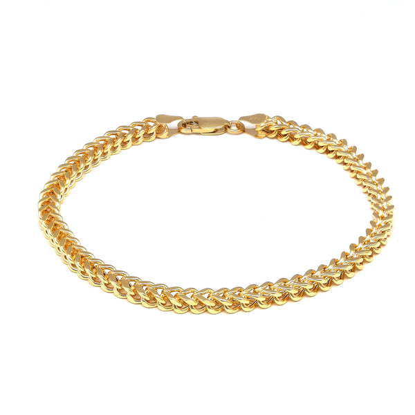 Pulsera eslabón tejido en oro amarillo 14 kilates.