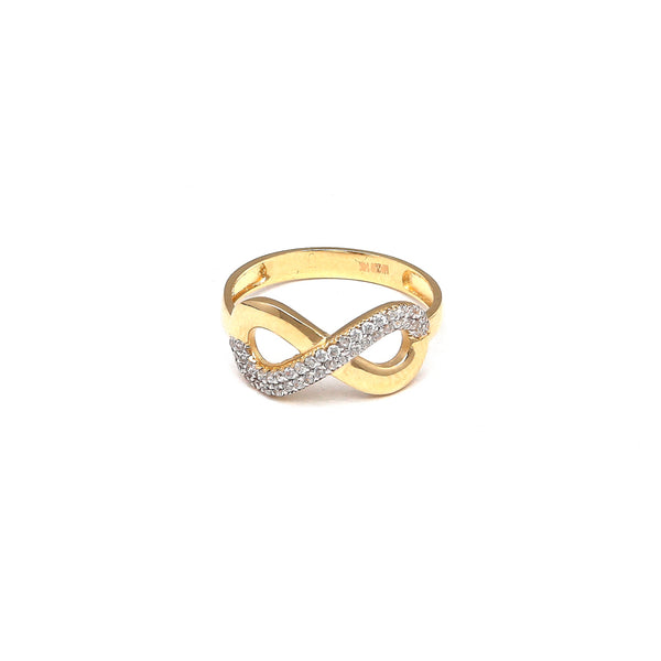 Anillo calado motivo infinito con circonias en oro amarillo 14 kilates.