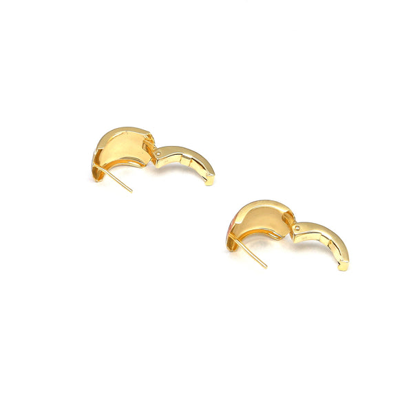 Aretes diseño especial en oro amarillo 14 kilates.