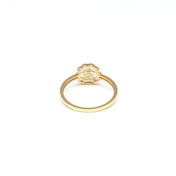 Anillo calado motivo flor con circonia en oro amarillo 14 kilates.