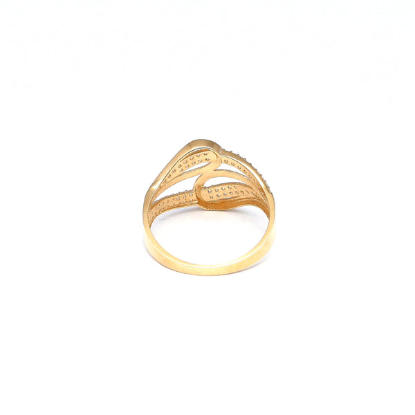 Anillo estilizado con circonias en oro amarillo 14 kilates.