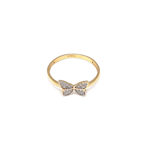 Anillo estilizado motivo mariposa con circonias en oro amarillo 14 kilates.