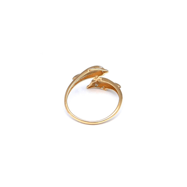 Anillo diseño especial motivo delfines en oro amarillo 14 kilates.