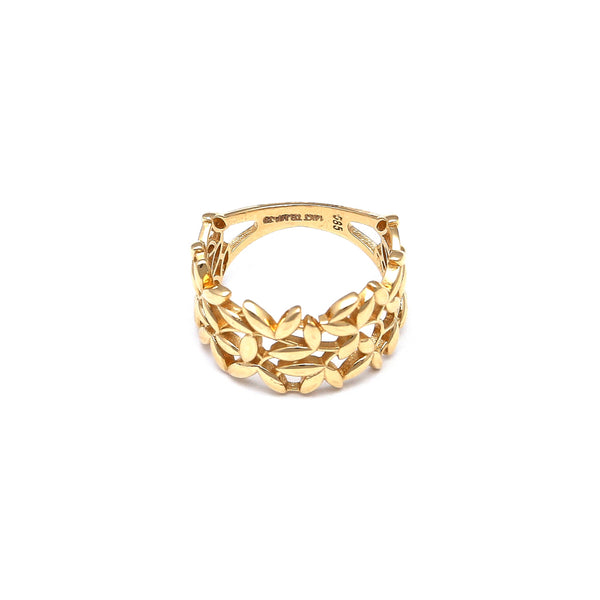 Anillo calado motivo hojas en oro amarillo 14 kilates.