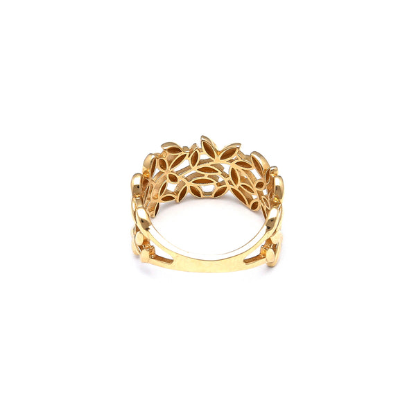 Anillo calado motivo hojas en oro amarillo 14 kilates.