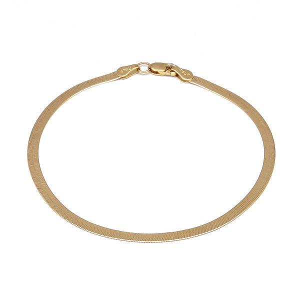 Pulsera eslabón planchado en oro amarillo 14 kilates.