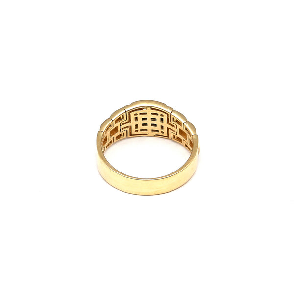 Anillo estilizado con sintéticos en oro amarillo 14 kilates.