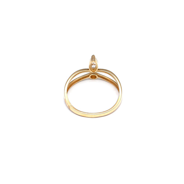 Anillo calado con circonia en oro amarillo 14 kilates.