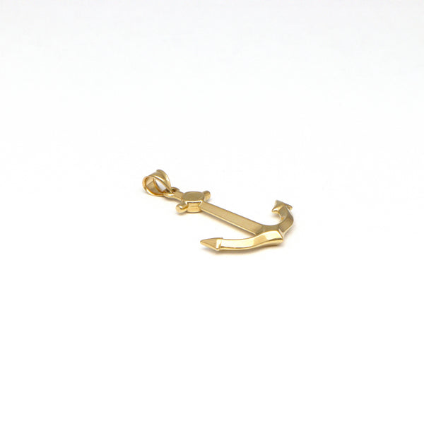 Dije diseño especial motivo ancla en oro amarillo 14 kilates.