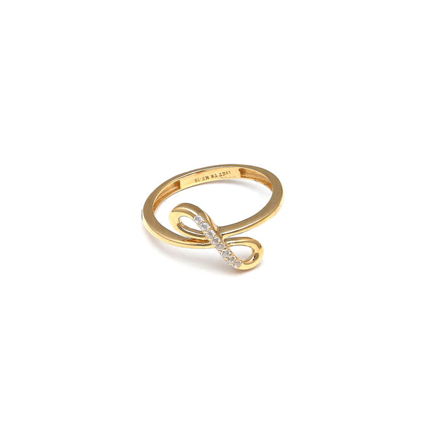 Anillo calado motivo infinito con circonias en oro amarillo 14 kilates.