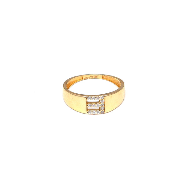 Anillo calado motivo letra con circonias en oro amarillo 14 kilates.