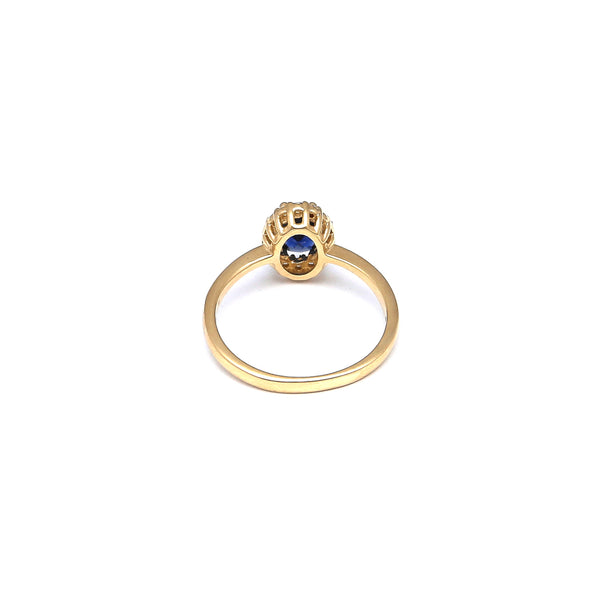 Anillo diseño especial con circonia y sintético en oro amarillo 14 kilates.