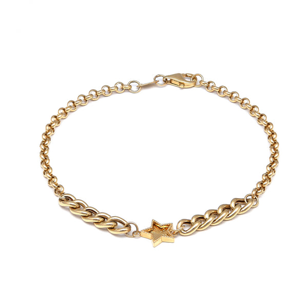 Pulsera eslabón combinado con aplicación motivo estrella en oro amarillo 14 kilates.