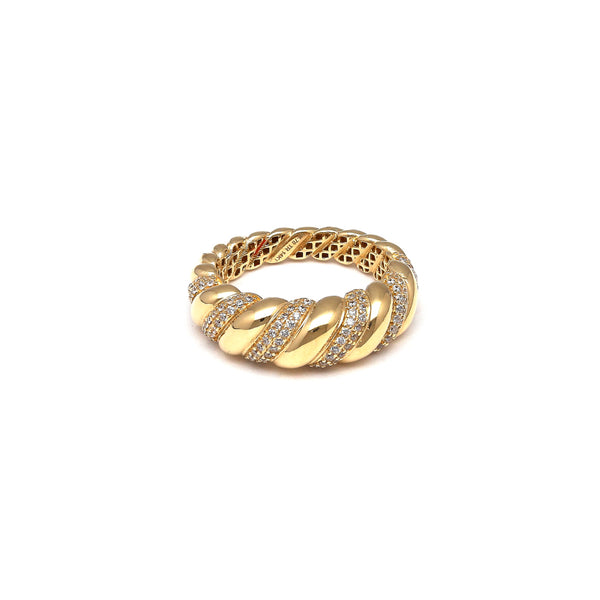 Anillo estilizado con circonias en oro amarillo 14 kilates.